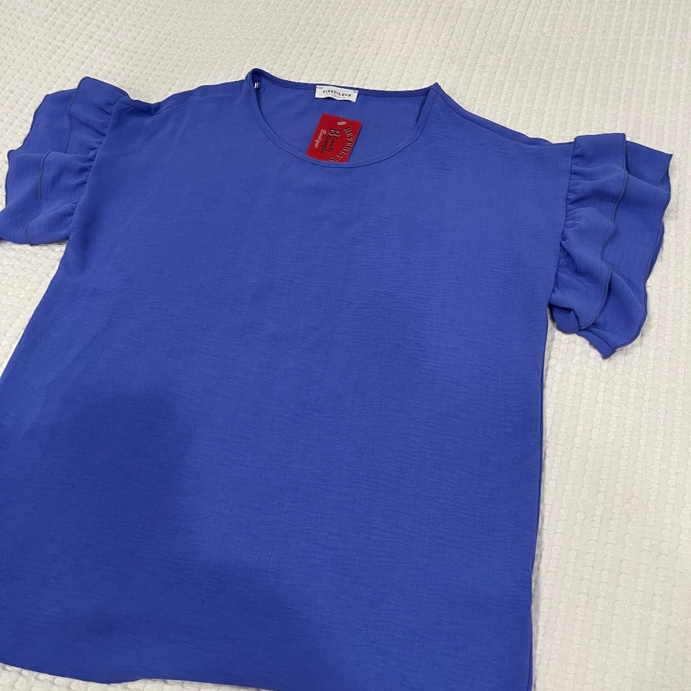 Never worn!  First Love blouse